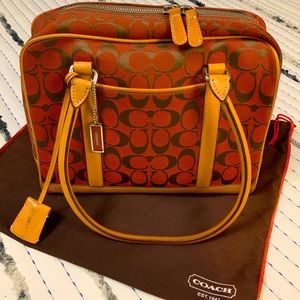 Coach women satchel in signature red jacquard and leather trim w/ dust bag